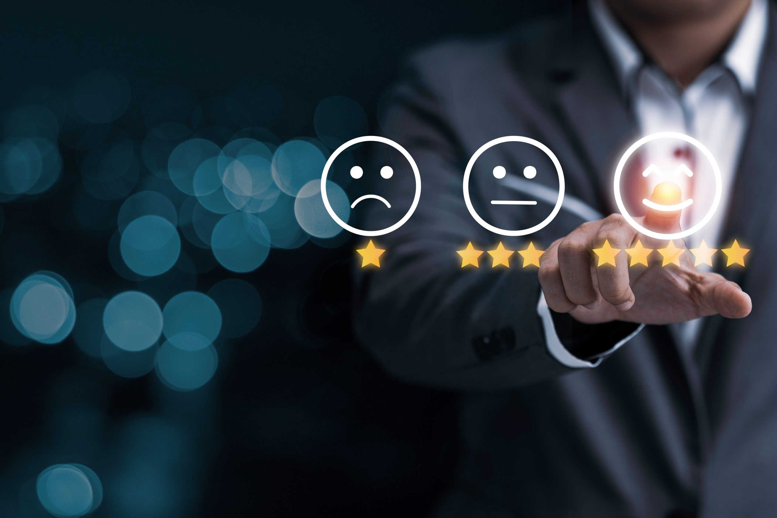 Businessman touching smile face icon for customer online evaluat